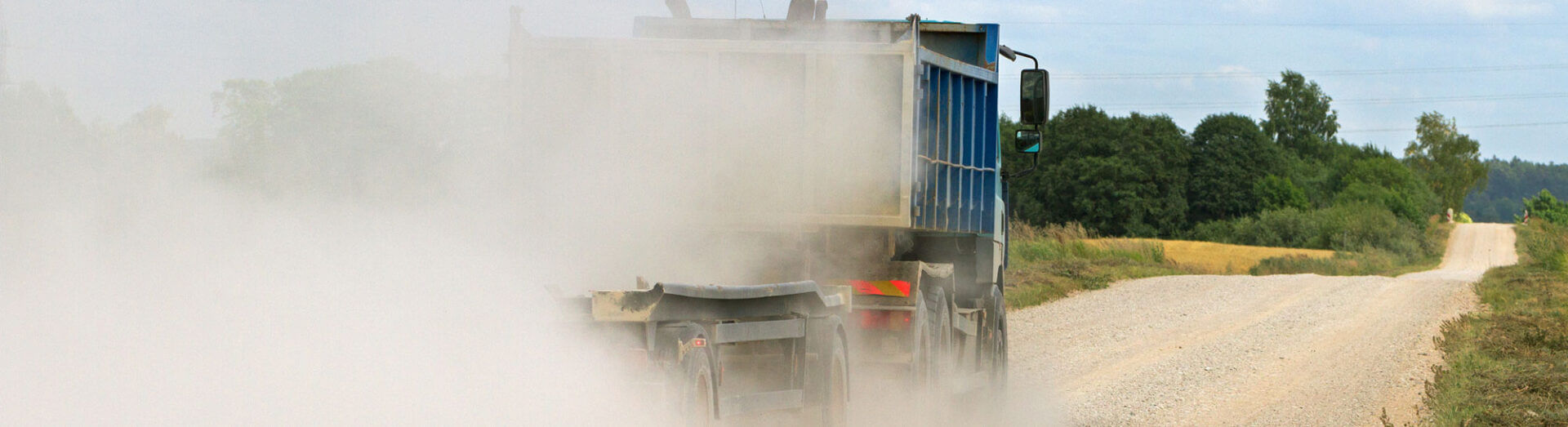Mist Of Dust On The Country Road.